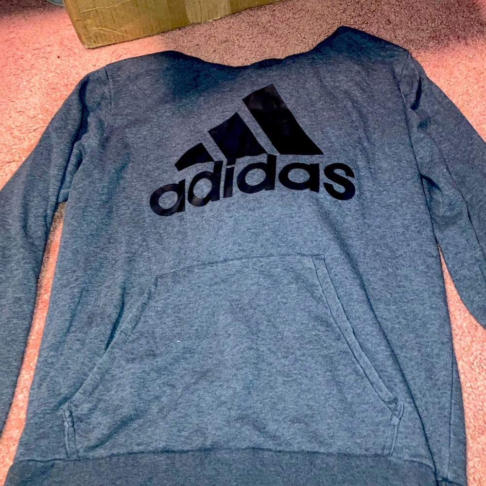 All grey Adidas hoodie.